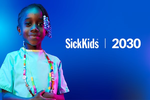 A child wearing Bravery Beads around her neck. SickKids 2030.