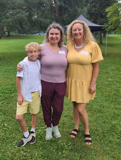 Ben, Rita and Jessica in a park at this year's barbecue.