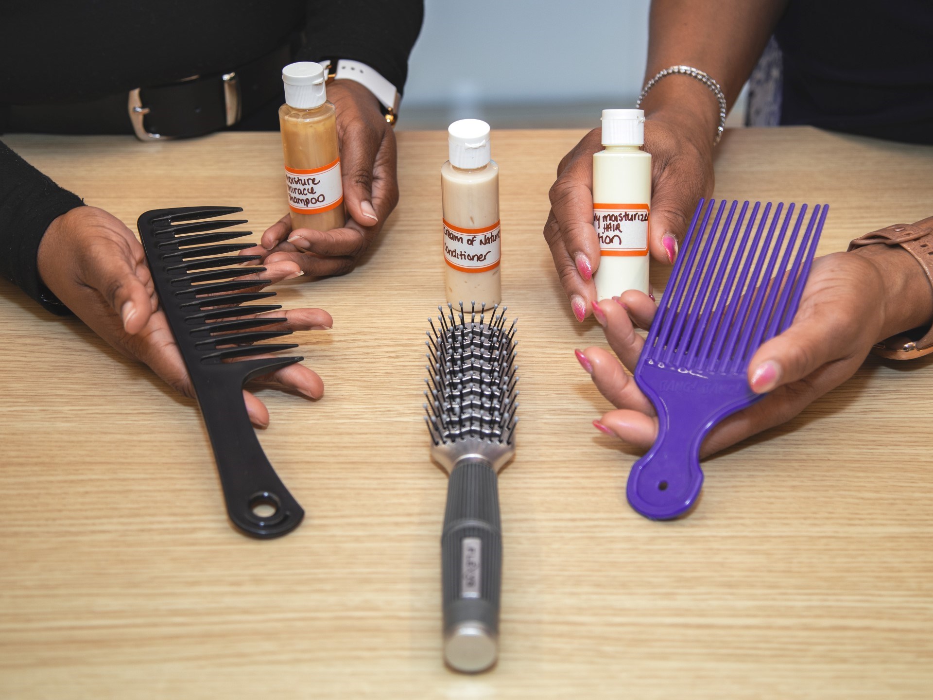 Hair products, including shampoo, conditioner, and combs, used for the Hair Equity initiative